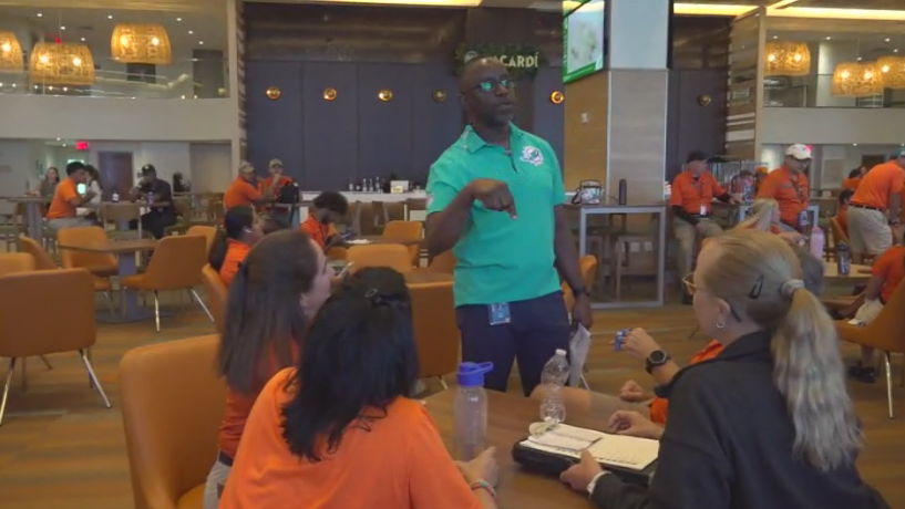 Miami Dade College professor finds his passion with side job at Hard Rock Stadium — CBS Miami, Aventura Arts news