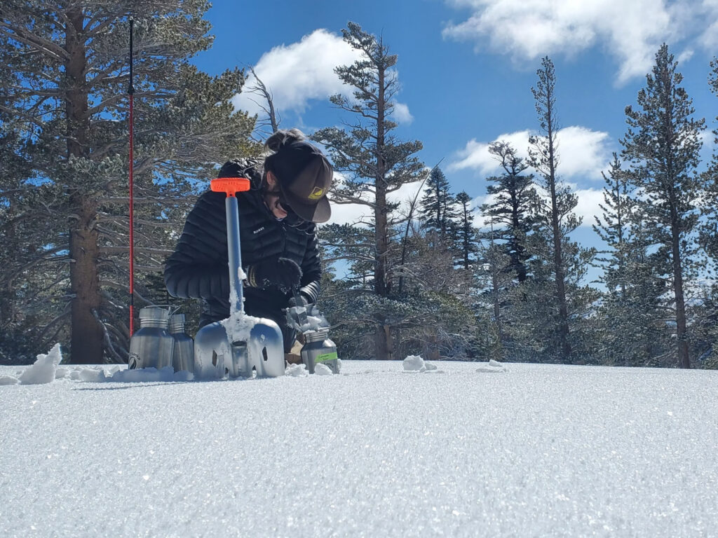 Aleksandra Karapetrov collecting snowfall in Sierra Nevada